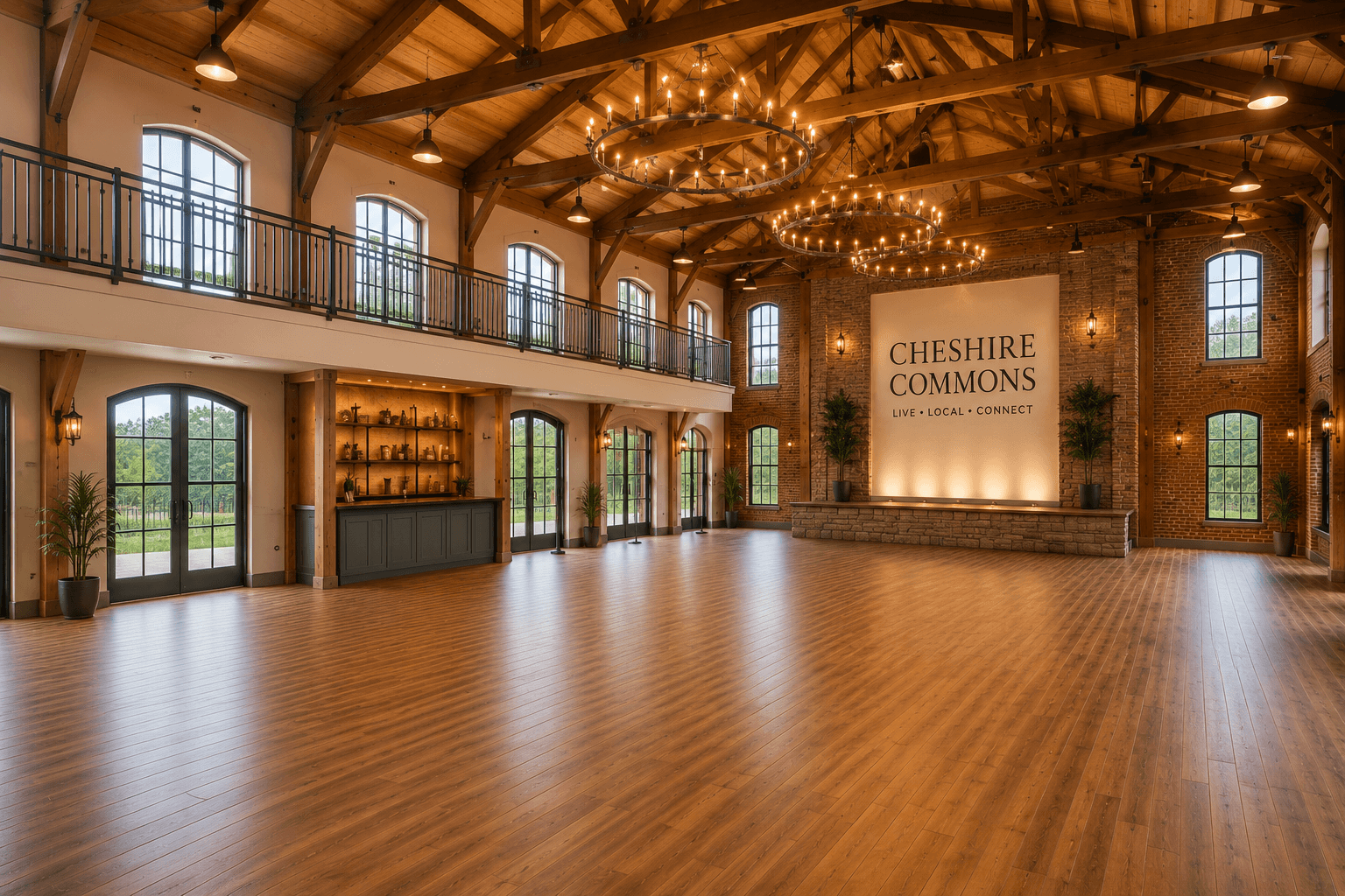 Grand Hall's vaulted timber ceiling, mezzanine balcony, and Cheshire Commons stage wall