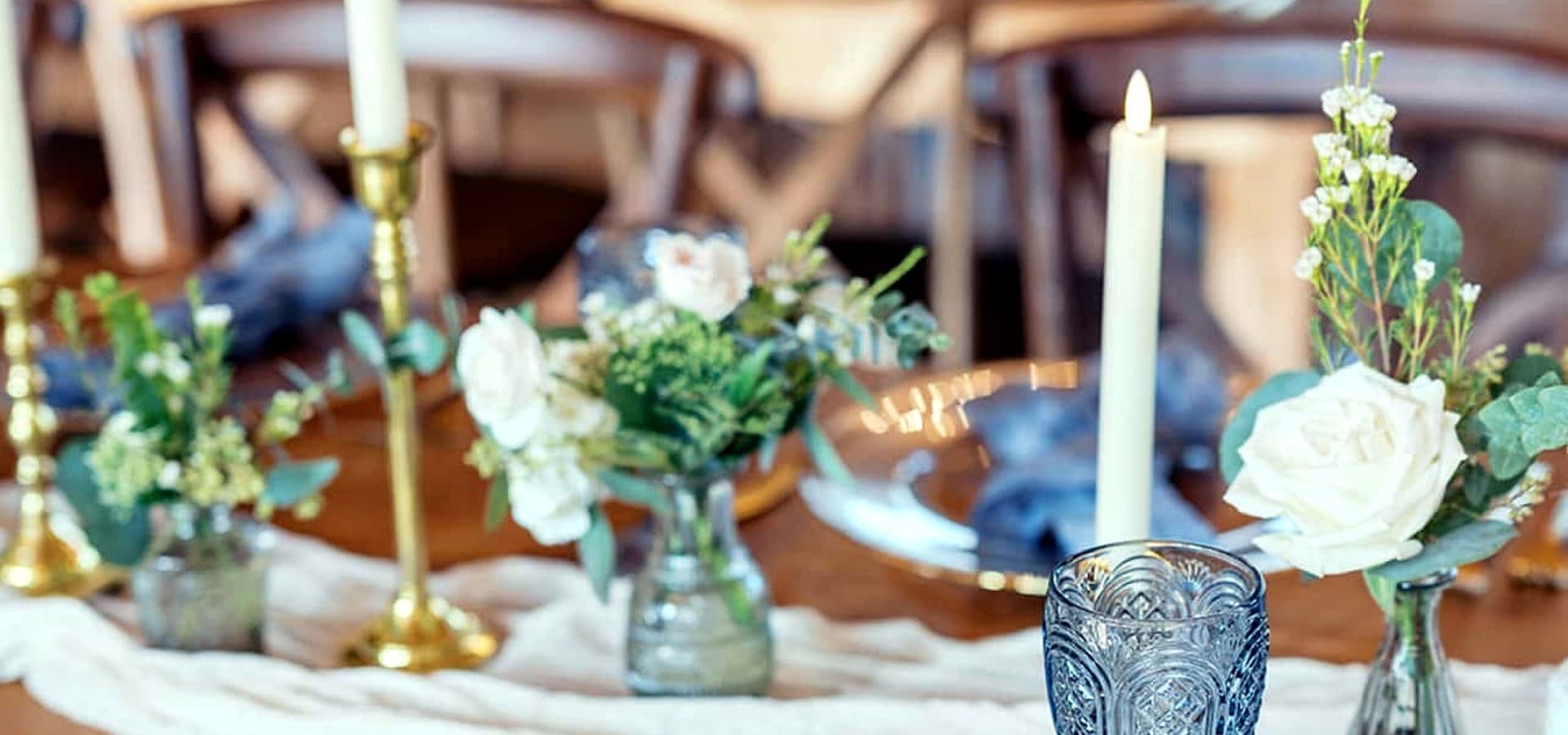Elegant table setting with candles and flowers